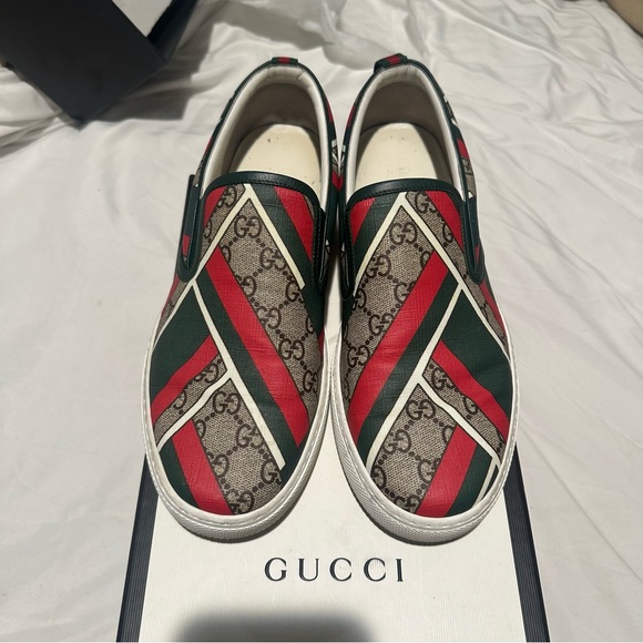 100% AUTHENTIC GUCCI SLIP ONS.  in excellent condition, size 9.5.